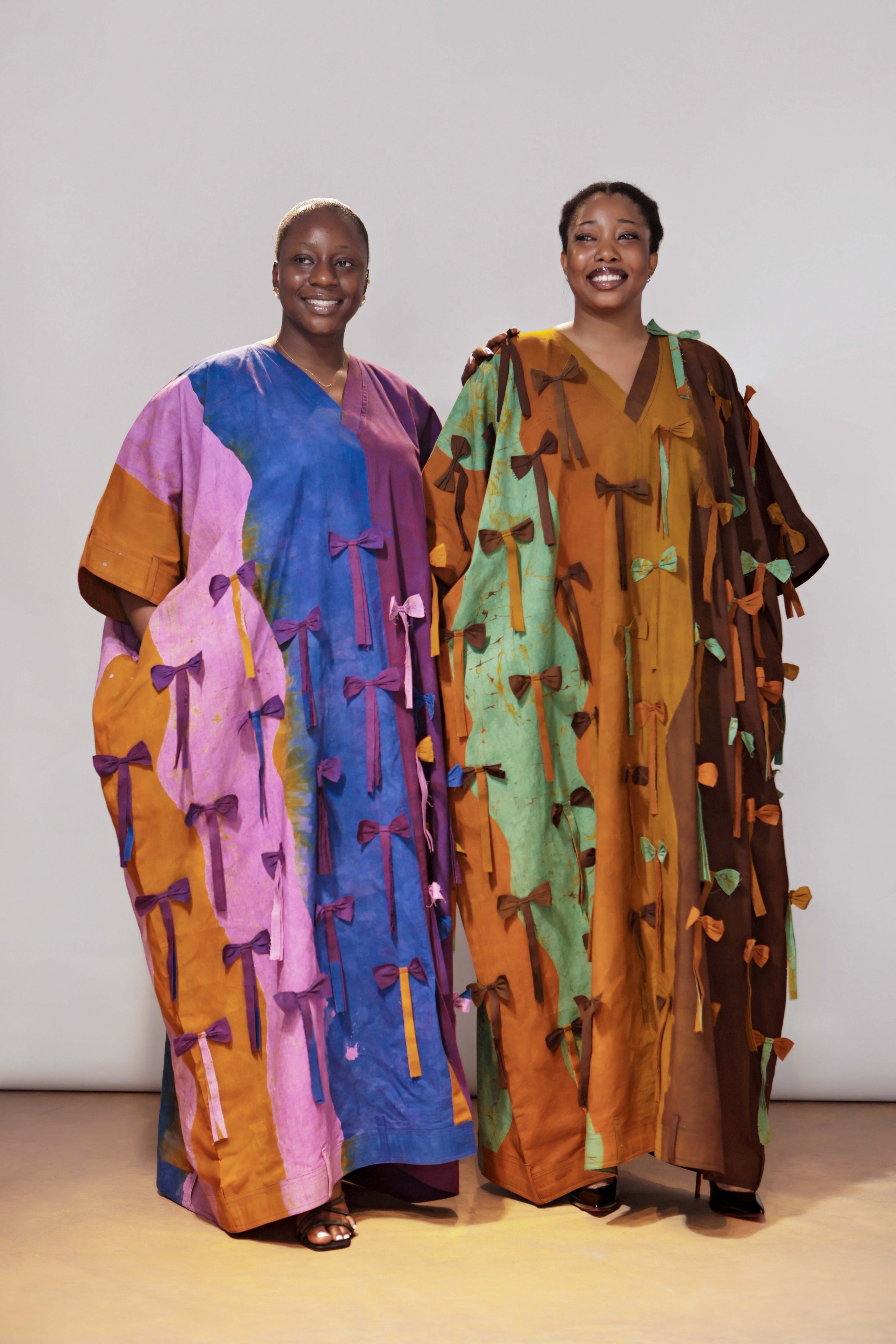 The Full Length bow Detail, Belt hole Hem and Sleeves Agbada