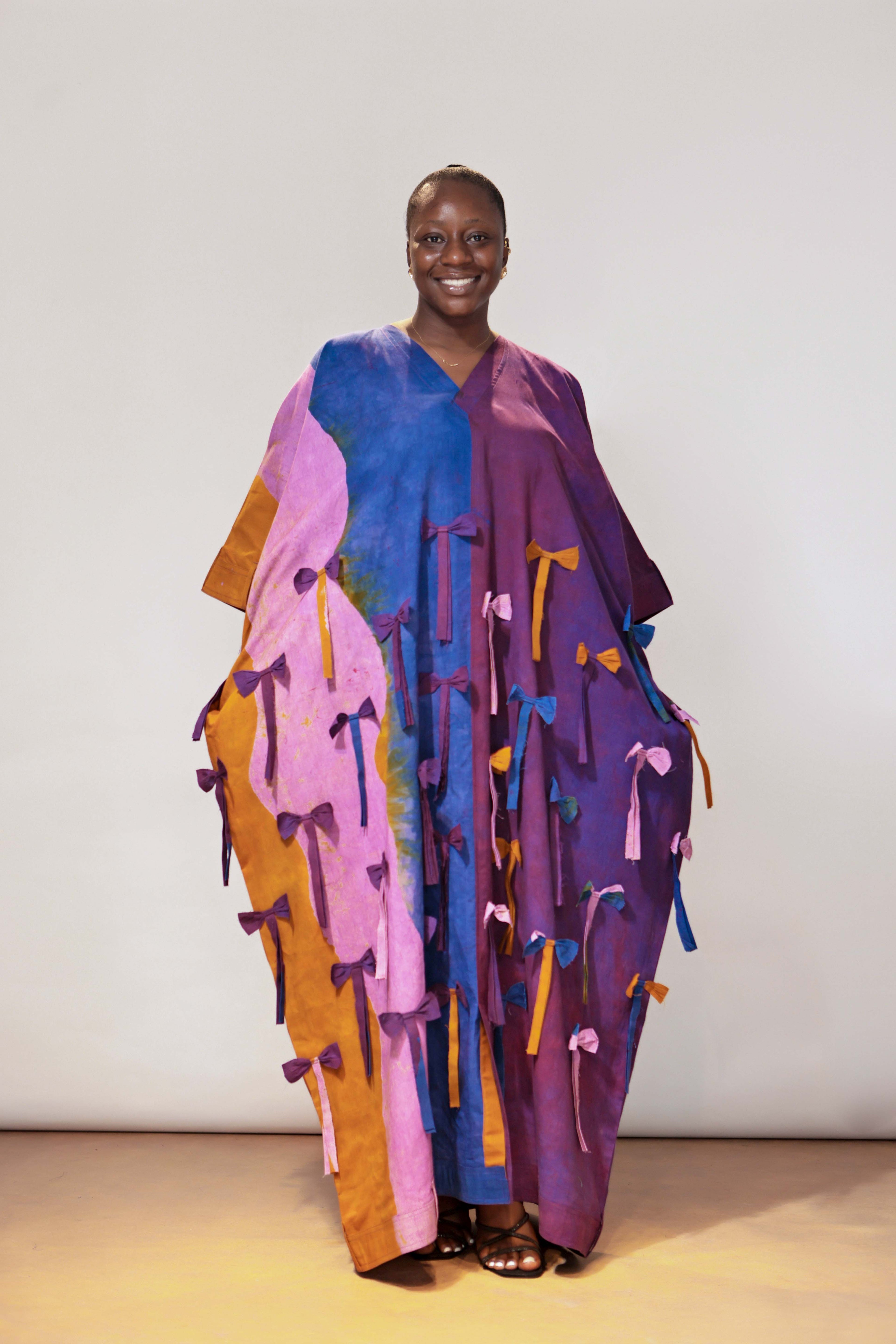 The Full Length bow Detail, Belt hole Hem and Sleeves Agbada