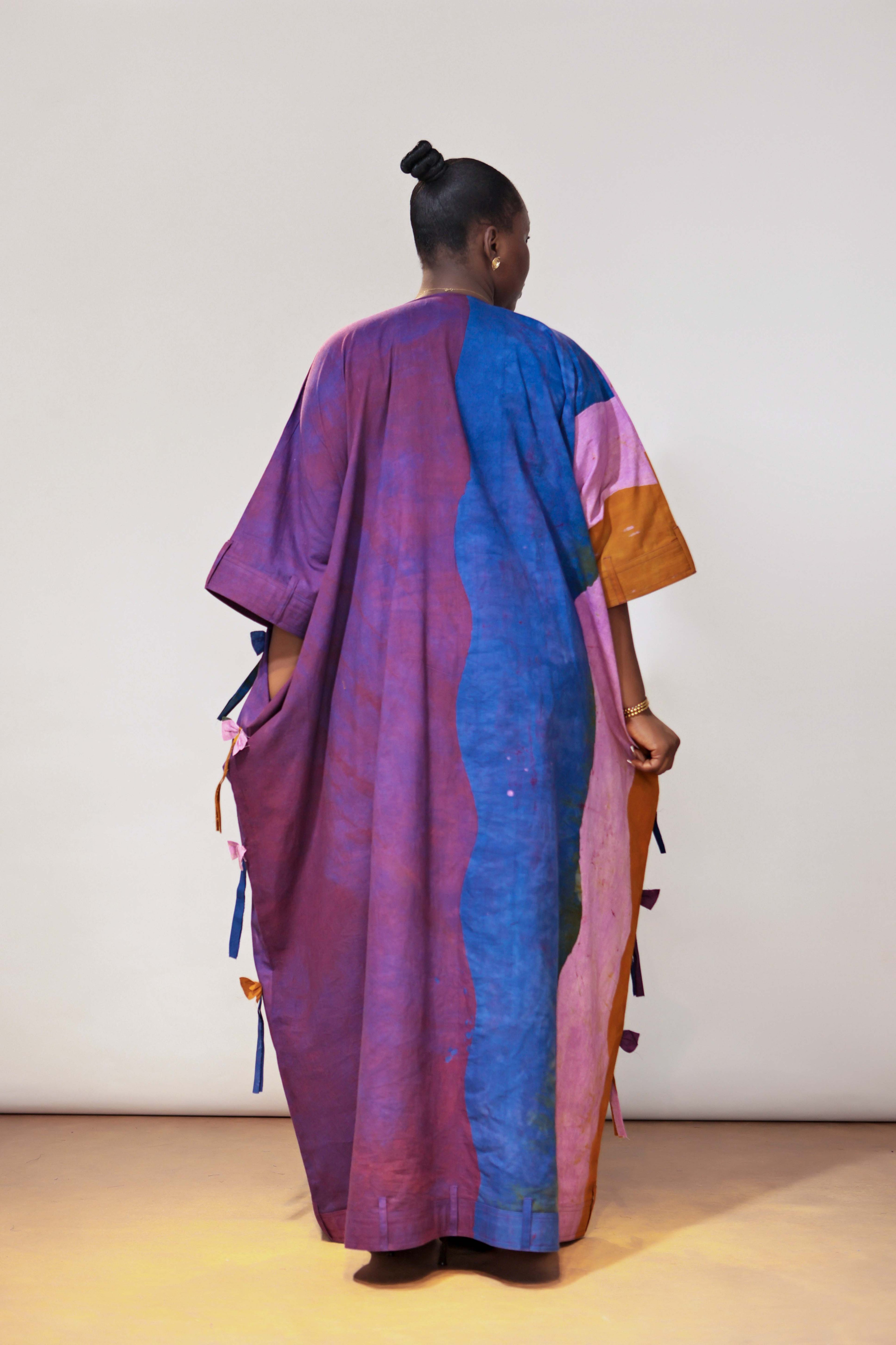The Full Length bow Detail, Belt hole Hem and Sleeves Agbada