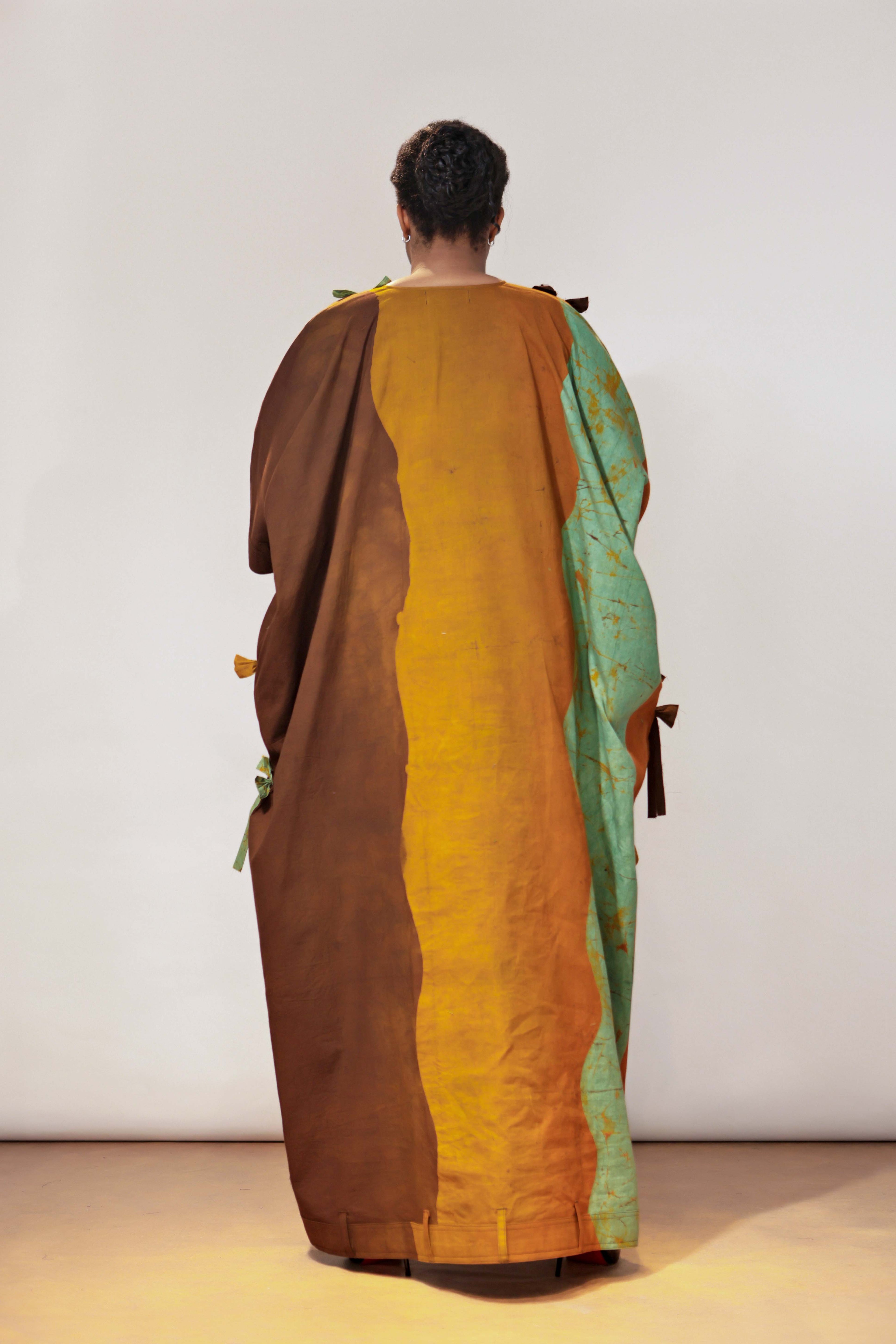 The Full Length bow Detail, Belt hole Hem and Sleeves Agbada