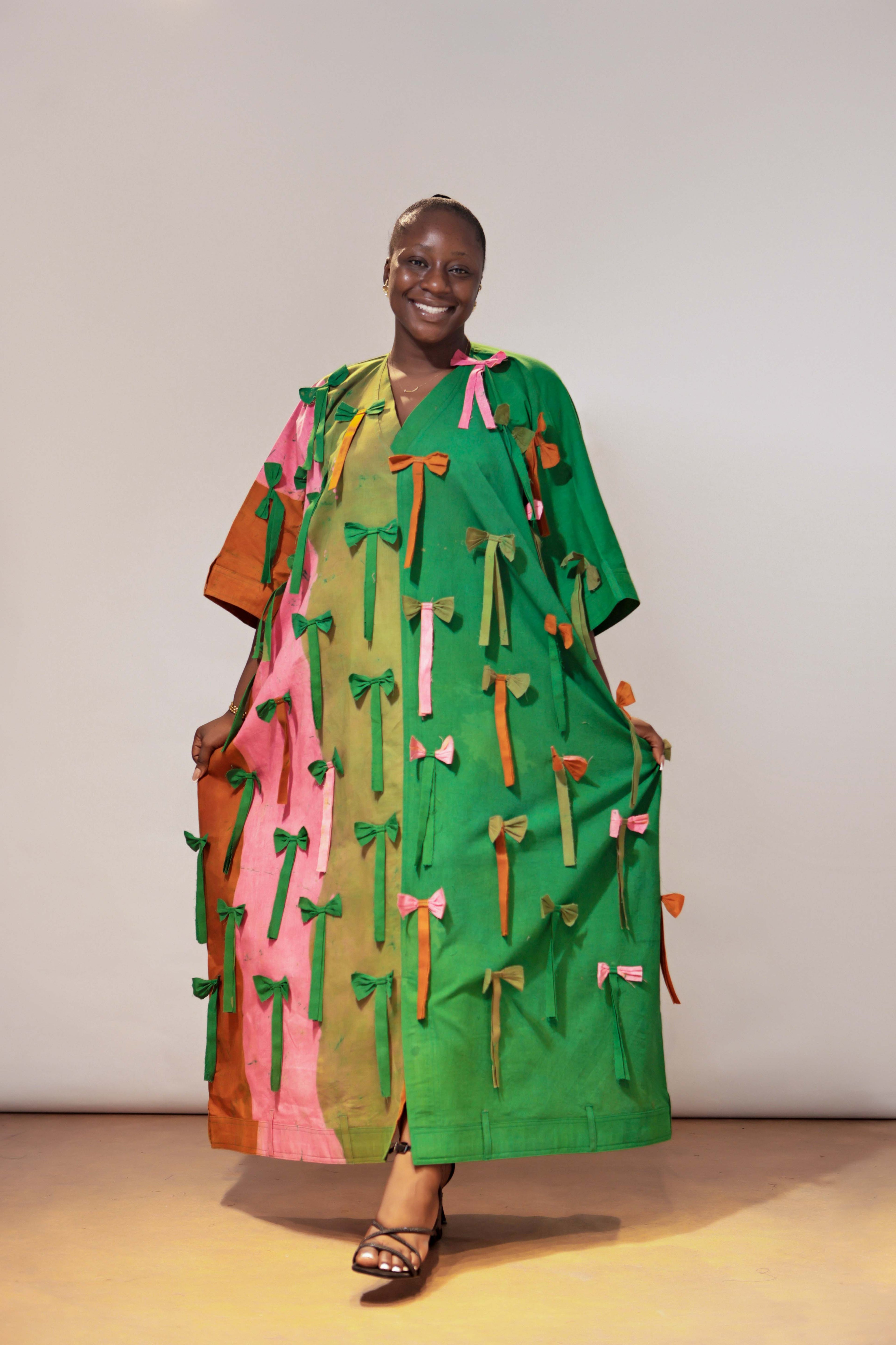 The Mini bow Detail, Belt hole Hem and Sleeves Agbada