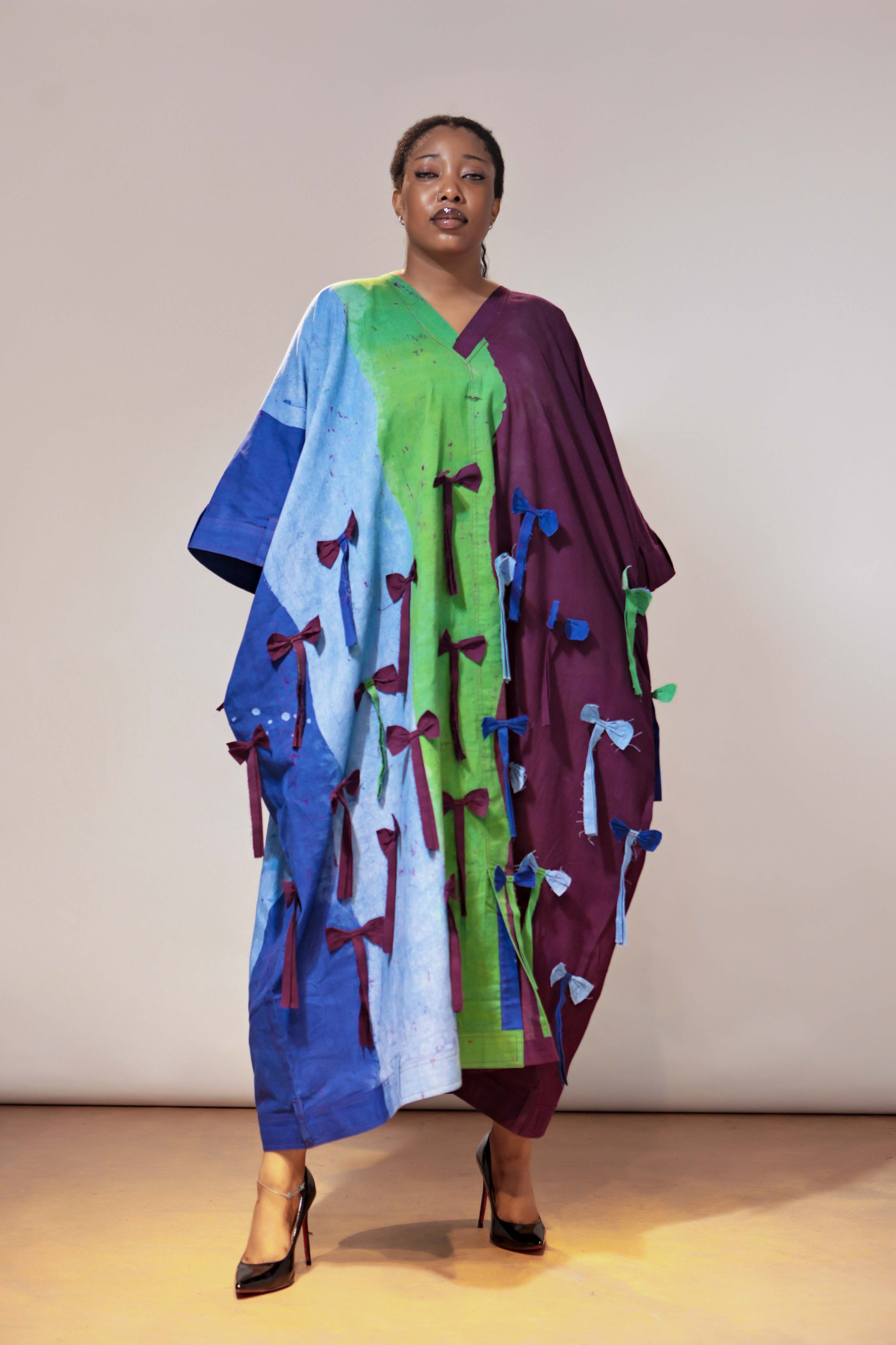 The Mini bow Detail, Belt hole Hem and Sleeves Agbada